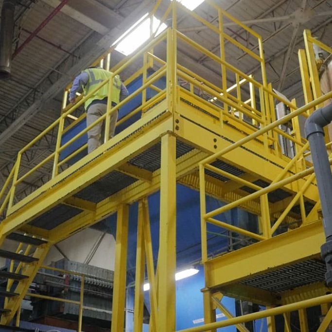 Steel Access Platform Yellow steel fabricated access platform for industrial use manufactured by Gateway Fabrications delivering nationwide